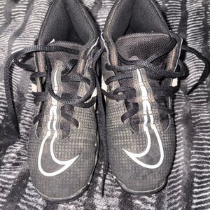 Nike Kids' Black Cleats with White Swoosh